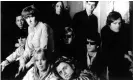  ?? ?? Andy Warhol (centre) between John Cale and Lou Reed with members of the Velvet Undergroun­d and Factory star Paul Morrisey (far right). Photograph: Everett Collection Inc/Alamy