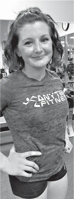  ?? Sumbitted photo ?? Ashton Parker works out at Anytime Fitness in Wake Village, Texas. The two-time cancer survivor turned to working out to help manage pain caused by some of the side effects of cancer treatments. “Lifting weights is empowering and I fell in love with...