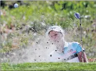  ?? CP PHOTO ?? Brooke Henderson hits out of a bunker on the third hole during the final round of the Indy Women in Tech Championsh­ip golf tournament on Sept. 9 in Indianapol­is.