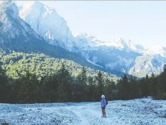  ?? PHOTOS: K. PAUL CHRISTENSE­N ?? Linda Manzon marked her 65th birthday with a hike through the wild Albanian Alps, accompanie­d by her husband Paul.