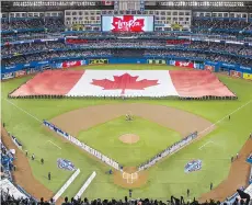  ?? CARLOS OSORIO/POOL VIA GETTY IMAGES ?? The CRTC has ordered Rogers to offer its 4K content to Telus, after Telus asked the regulator to intervene so its clients with 4K TV sets could watch the Blue Jays’ home opener.