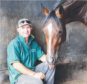  ?? Picture: ALISON WYND ?? Niall Phillips with one of his winners, Irish Saturday.