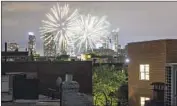  ?? John Minchillo Associated Press ?? FIREWORKS explode during Juneteenth celebratio­ns last week above New York’s Brooklyn borough.