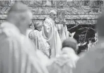  ?? Vatican Media via Tribune News Service ?? Pope Francis celebrates Easter Mass at St. Peter’s Basilica in The Vatican with coronaviru­s restrictio­ns in place.