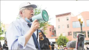  ?? Matthew Brown / Hearst Connecticu­t Media ?? Stamford Mayor David Martin speaks to protesters gathered in Columbus Park while they march from Scalzi Park on June 3.