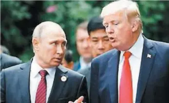  ?? PHOTO D’ARCHIVES, AFP ?? Valdimir Poutine et Donald Trump lors du sommet de L’APEC de novembre dernier.