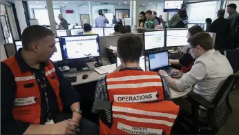  ?? Submitted to The McLeod River Post ?? Emergency management profession­als conducting an exercise at the Provincial Operations Centre.