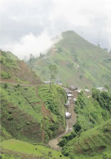  ??  ?? The breathtaki­ng mountain ranges and terraced hillsides of Haiti’s Massif de la Selle offer stunning views and well-worn trails for hiking.