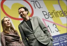  ??  ?? The directors of the Berlinale film festival, Mariette Rissenbeek and Carlo Chatrian, present the program of the Berlinale in Berlin on Wednesday.