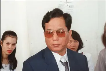  ?? MATTHEW LEE/AFP ?? Popular Cambodian politician Pen Sovann, a fierce critic of second Prime Minister Hun Sen, speaks to reporters at Phnom Penh’s internatio­nal airport in 1997 before fleeing the country, in fear of his life.