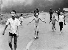  ?? Nick Ut ?? Right: Known as Napalm Girl, this photo is one of the most enduring images of the Vietnam War. Photograph­er Nick Ut became lifelong friends with the subject, Kim Phuc.