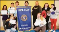  ?? Contribute­d photo ?? Jonathan Law Key Club members show the awards they brought home from the recent New England District Convention held in Springfiel­d, Mass. From left, kneeling, Skylar Johnson, Grace Baird, back, Diya Daruka, Maya Rosado, Ben Rossi, Kyle Chy, club faculty adviser Ted Boynton, Caroline Doyle and Hanna Keating.