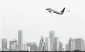  ?? FILE PHOTO BY DAVID J. PHILLIP, AP ?? A Continenta­l Airlines jet takes off from George Bush Interconti­nental Airport April 27, 2010, flying over downtown Houston.