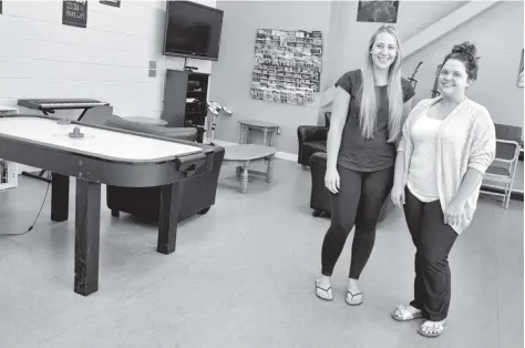  ?? [WHITNEY NEILSON / THE OBSERVER] ?? Carlina Longworth and Mariah Roth are two of the friendly faces you’ll see at the Youth Centre. They’re encouragin­g youth entering Grade 6 up to age 19 to come out this summer and participat­e in their activities at the centre and scheduled day trips.