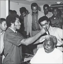  ?? CHERYL MORROW PHOTO ?? In this undated photo, Willie Morrow demonstrat­es his hair-styling techniques. The inventor of the Afro pick died June 22.