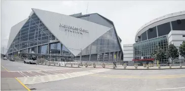  ?? JOHN BAZEMORE / ASSOCIATED PRESS ?? Eleven sports events are scheduled for Mercedes-Benz Stadium’s opening month. Along with Falcons games, the schedule includes two college football games and six Atlanta United matches.