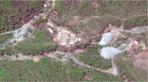  ??  ?? Satellite image shows a dismantled Punggye-ri nuclear test facility in North Hamgyong Province. — Reuters