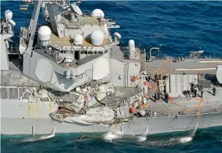  ?? REUTERS ?? The guided missile destroyer USS Fitzgerald suffered extensive damage to its hull, deck and radar systems in a collision with a merchant ship in Japanese waters.