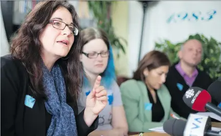  ?? CHRISTINNE MUSCHI ?? Katharine Cukier, left, speaks during a press conference with, from left, Kathleen Salvail, Claudia Taboada and Sam Kuhn, all parents of children with autism spectrum disorder, at the offices of CRARR on Sunday. The parents are pushing for more help...