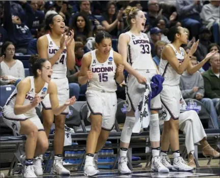  ?? JESSICA HILL — THE ASSOCIATED PRESS ?? From left, UConn’s Kia Nurse, Napheesa Collier, Gabby Williams, Katie Lou Samuelson and Saniya Chong react during the second half of Saturday’s NCAA tournament first-round game against Albany in Storrs.