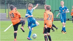  ??  ?? Age 12 DUSC (tangerine) recently played St James at Craigie 3G.