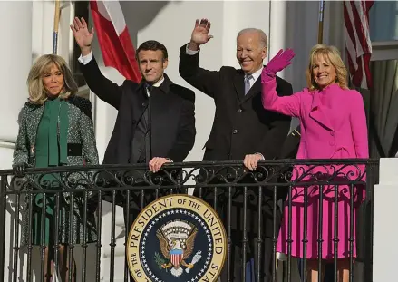  ?? Photo: AP ?? From left: Brigitte Macron, French President Emmanuel Macron President, U.S. President Joe Biden and first lady Jill Biden wave from the Blue Room Balcony during a State Arrival Ceremony on the South Lawn of the White House in Washington on December 1, 2022.
