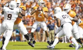  ?? STAFF PHOTO BY ROBIN RUDD ?? Tennessee’s Jarrett Guarantano looks to pass against UTEP on Saturday.