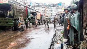  ?? - PTI ?? ALERT: Indian Army deployed in Darjeeling town before the funeral procession of two people who died in the police firing.