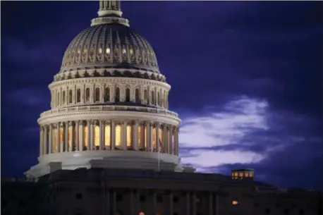  ?? J. SCOTT APPLEWHITE — THE ASSOCIATED PRESS FILE ?? This file photo shows the Capitol Dome at dawn in Washington.