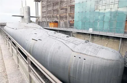  ?? REUTERS ?? The French submarine ‘Le Redoutable’ rests in a drydock at the Cite de la Mer naval museum in Cherbourg-en-Contentin, France. The French shipbuildi­ng town is in shock over lost Australian submarine orders as the country has switched to purchase US nuclear ones under the Aukus pact.
