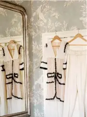  ??  ?? Left: Alessandra Rich and Emilia Wickstead outfits in the bedroom. Right: in the study, wearing silk dress, £1,200, Vilshenko