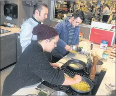  ?? JOSH LEWIS/THE GUARDIAN ?? The sixth class on Nov. 22 was all about breakfast. Chef Nathan Schoenfeld­t instructs Jessica Praught and Liam Mullen as they make an omelette.