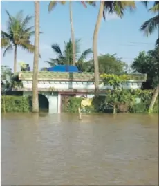  ??  ?? One of the many homes devastated by floods in Kerala.