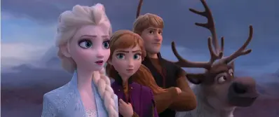  ?? Associated Press ?? ■ This image released by Disney shows Elsa, voiced by Idina Menzel, from left, Anna, voiced by Kristen Bell, Kristoff, voiced by Jonathan Groff and Sven in a scene from the animated film, “Frozen 2.”