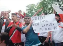  ?? — AFP ?? River Plate’s supporters protest outside the club’s stadium in Buenos Aires on Saturday.