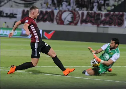  ?? Supplied photo ?? Al Wasl keeper Yousef Al Zaabi blocks a shot from Al Wahda’s Balazs Dzsudzsak during the President’s Cup semis. —