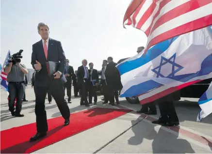  ?? JASON REED/POOL/THE ASSOCIATED PRESS ?? U.S. Secretary of State John Kerry boards his plane after meeting Israeli Prime Minister Benjamin Netanyahu in Tel Aviv this month. A mutual fear over a nuclear deal that could leave much of Iran’s atomic program intact has seen Israel and the Gulf...