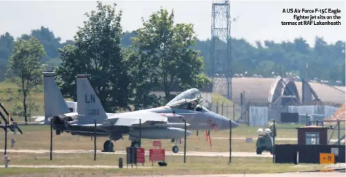  ??  ?? A US Air Force F-15C Eagle
fighter jet sits on the tarmac at RAF Lakenheath