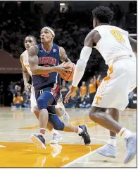  ?? AP/CRYSTAL LOGUIDICE ?? Auburn guard Bryce Brown (2) leads Auburn in scoring at 15.9 points per game. As a team, Auburn is averaging 87.3 points per game and has scored more than 90 points four times.