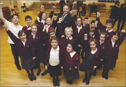  ??  ?? Hasmonean Primary Head Dr Alan Shaw with some of his pupils at the Hendon school