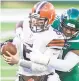  ?? COREY SIPKIN/ASSOCIATED PRESS ?? Jets defensive end John Franklin-Myers sacks, right, Cleveland quarterbac­k Baker Mayfield on Sunday, when the Browns didn’t have their usual contingent of receivers because of COVID-19 concerns.