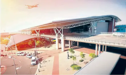  ??  ?? NOTHING BUT BLUE SKIES: This artist’s impression of the new East London Airport after its upgrades envisions a sleek and modern new departures lounge and multistore­y parking.