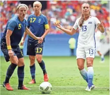  ?? CHRISTOPHE­R HANEWINCKE­L, USA TODAY SPORTS ?? Alex Morgan, right, and the U.S. women’s soccer team was ousted by Sweden in the quarterfin­als.