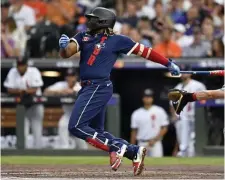 ?? Getty IMaGes ?? RARE AIR: Toronto’s Vladimir Guerrero Jr. hits a home run in the third inning of the 91st MLB All-Star Game at Coors Field on Tuesday. Guerrero was named the game’s MVP as the American League won 5-2.
