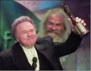  ?? REED SAXON — THE ASSOCIATED PRESS FILE ?? In this file photo, musician Roy Clark celebrates after receiving the Pioneer Award at the Academy of Country Music Awards in Universal City.