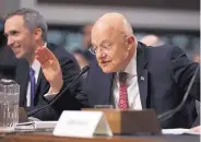  ?? MANUEL BALCE CENETA/ASSOCIATED PRESS ?? Director of National Intelligen­ce James Clapper, right, testifies on Capitol Hill Thursday before the Senate Armed Services Committee hearing on cyber threats to the U.S.