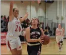  ??  ?? Boyertown’s Julia Smith (25) drives to the basket as Owen J. Roberts’ Maddi Koury defends.