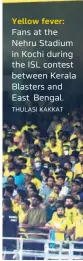  ?? THULASI KAKKAT ?? Yellow fever:
Fans at the Nehru Stadium in Kochi during the ISL contest between Kerala Blasters and East Bengal.