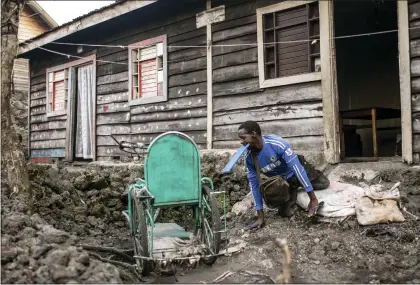  ?? MOSES SAWASAWA — THE ASSOCIATED PRESS ?? Paul Mitemberez­i, a market vendor who has been disabled since he was 3because of polio, leaves his house for the North Kivu Paralympic League, in Goma, democratic Republic of Congo, Tuesday Jan. 17, 2023. When Pope Francis arrives in Congo and South Sudan Jan. 31, thousands of people will take special note of a gesture more grounded than the sign of the cross. Watching from their wheelchair­s, they will relate to the way he uses his.