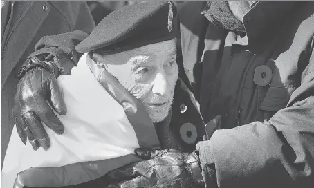  ?? DAN JANISSE ?? Korean War veteran Stan Gauthier, 87, was one of many people attending the Remembranc­e Day ceremony in downtown Windsor on Saturday.